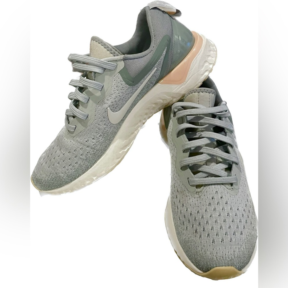 Nike running shoes women’s 6.5 light blue pink peach